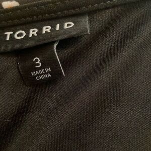 Black Torrid dress with fabric belt and pockets.
